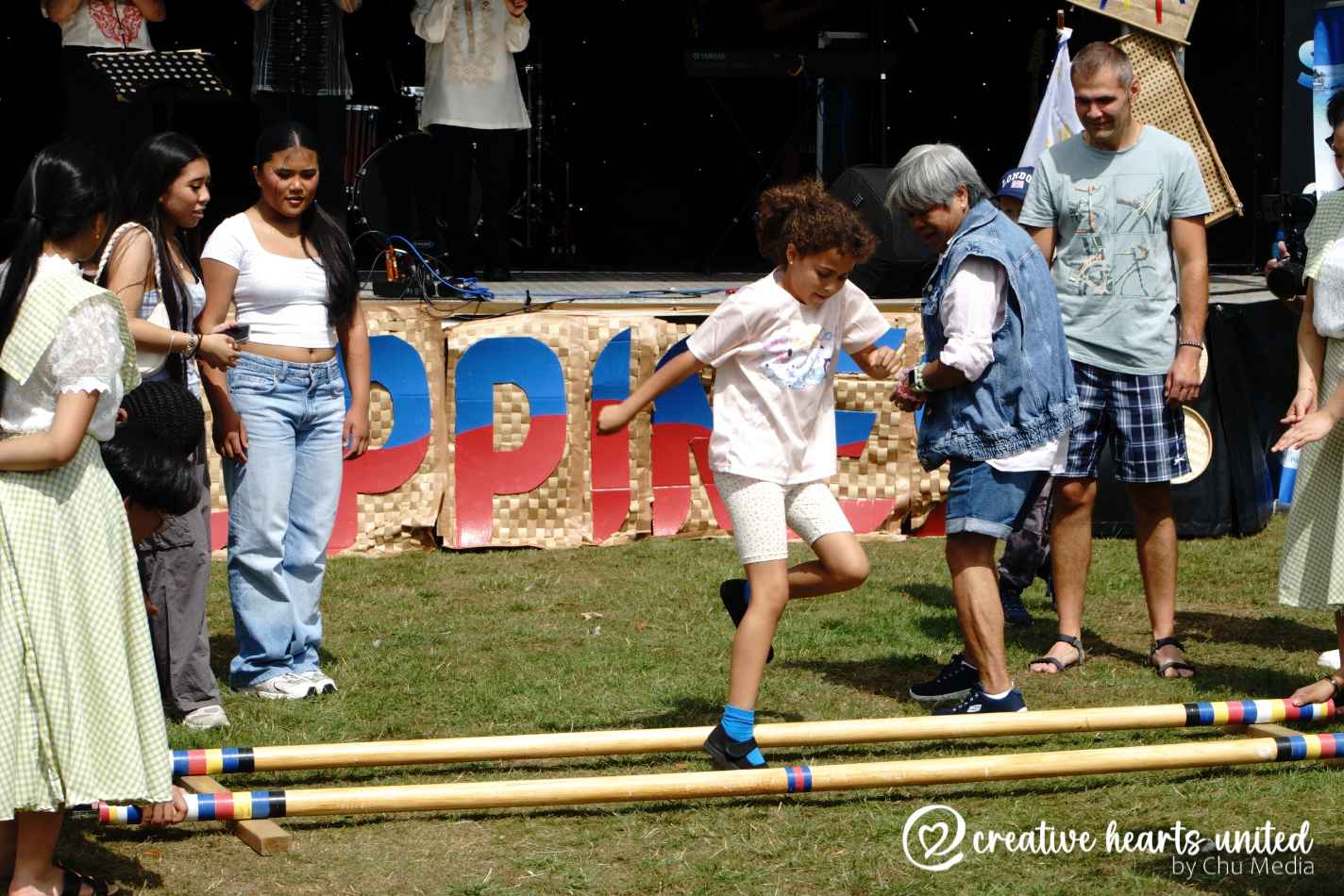 Creative Hearts United Youth Dance the Tinikling at Cheshire East Bario Fiesta