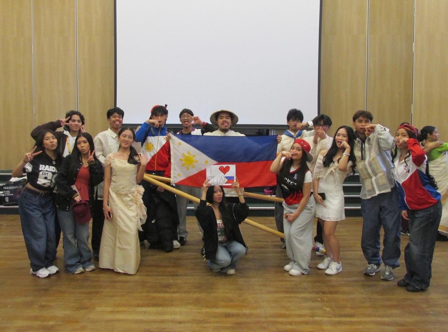 Students in Bradford showcase Filipino culture through a vibrant Tinikling dance