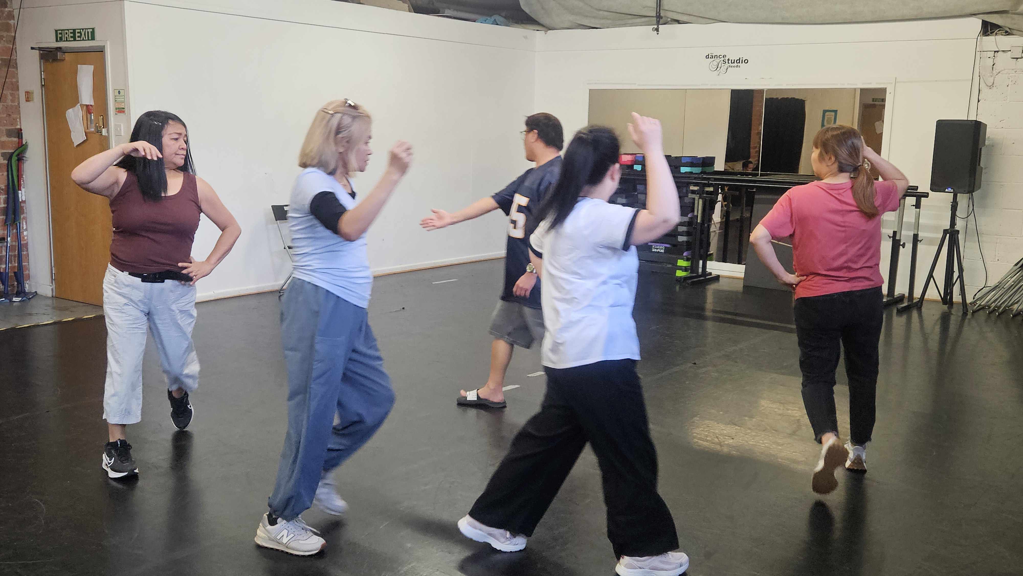 ehind the scenes: refining steps, spacing, and transitions for the upcoming routine.