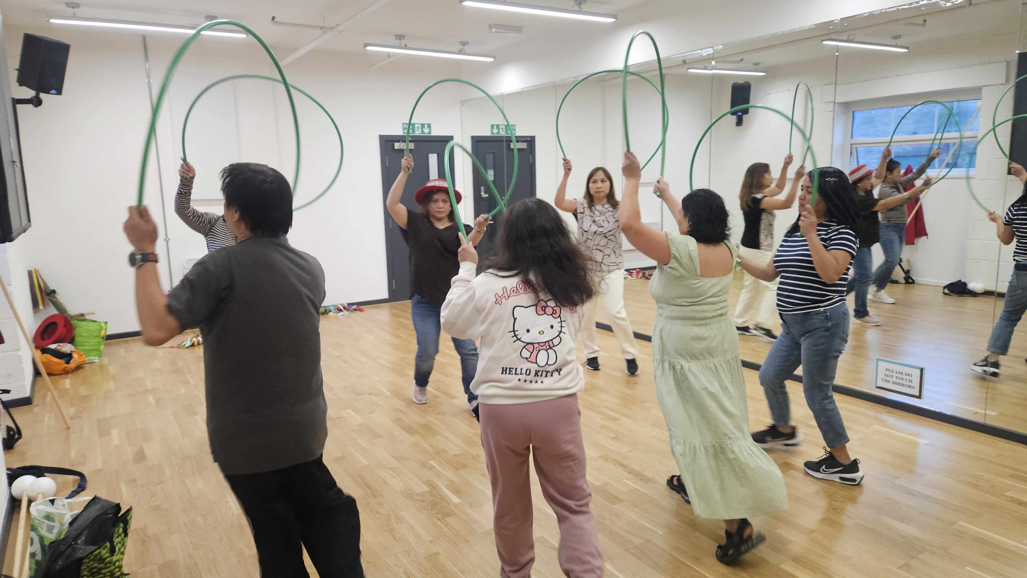 Dance workshop participants with their Bulaklakan arches.