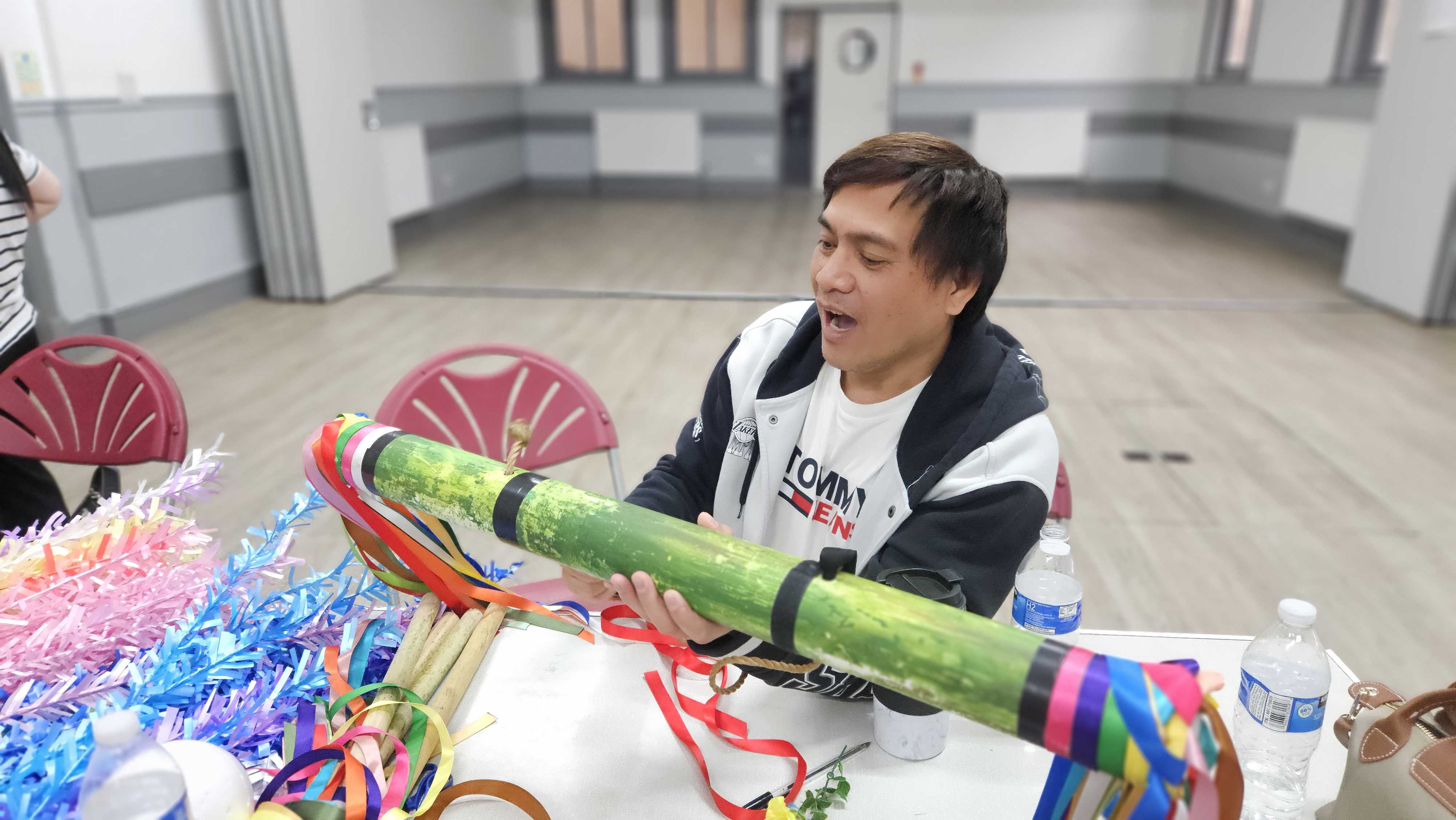 Making Karatong folk dance props.
