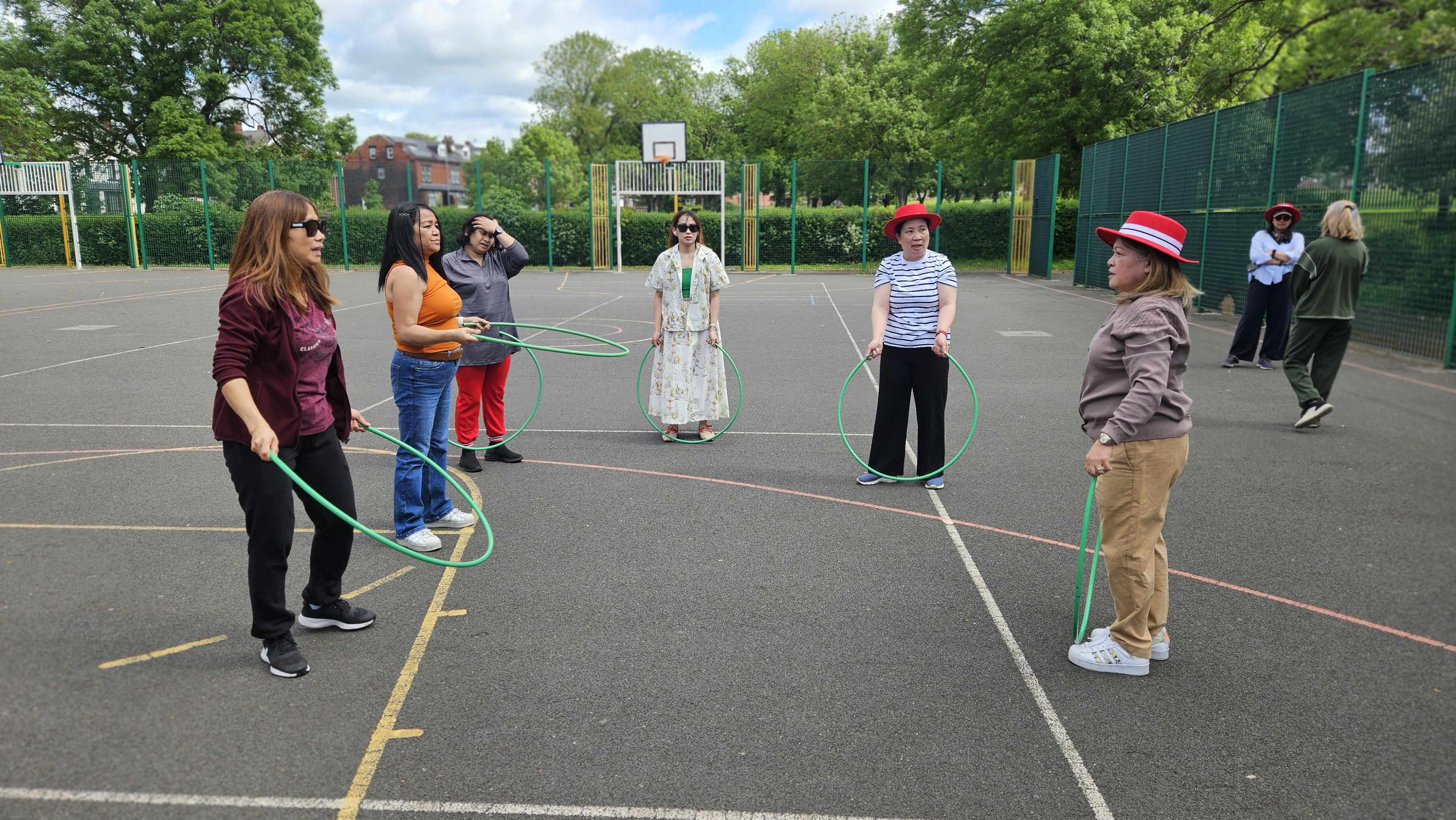 Making the most of the space, today, the basketball court becomes our dance studio.