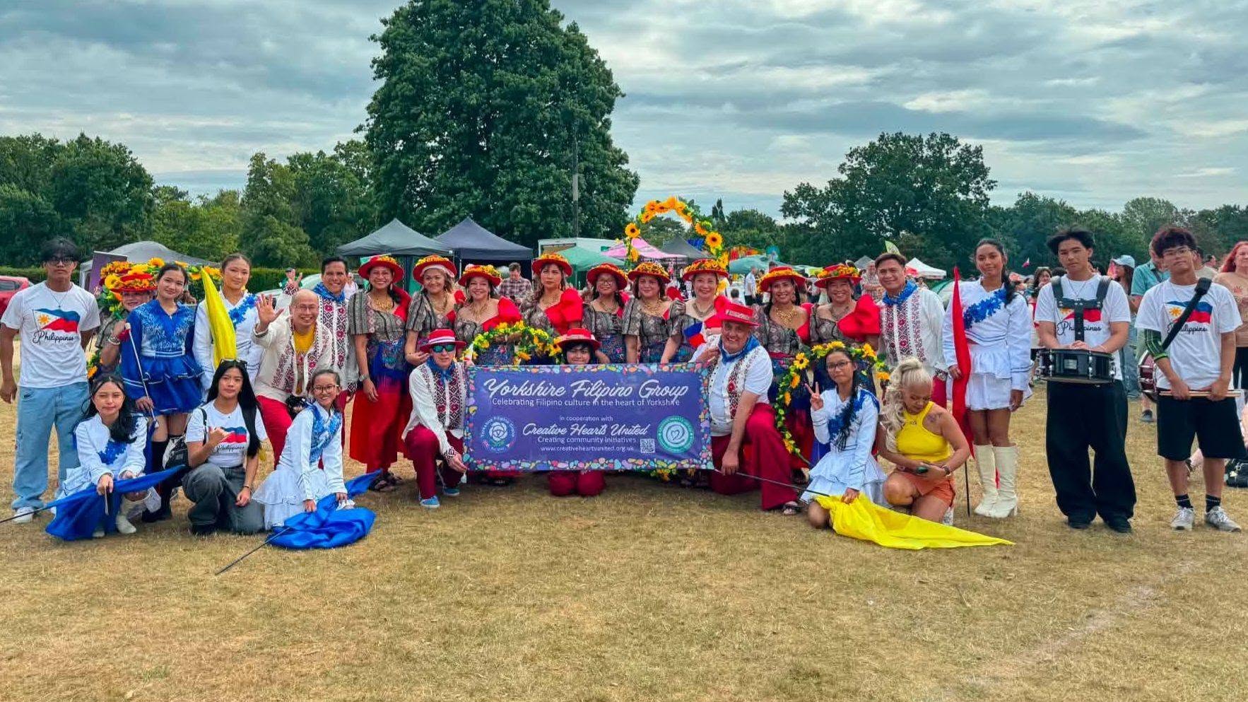 The Creative Hearts United contigent in Cheshire East Barrio Fiesta 2026. The 35 delegates comprising from Yorkshire Filipino Group and NJr Drum and Flag Corps.