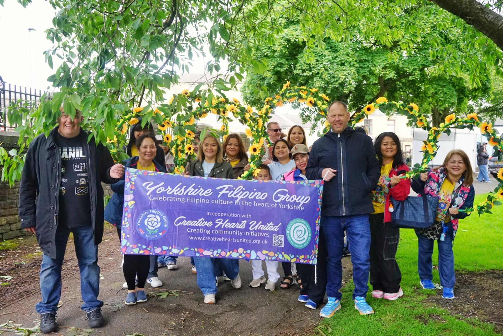A vibrant photo opportunity with the entire entourage, capturing the spirit and colour of the Bradford Barrio Fiesta.